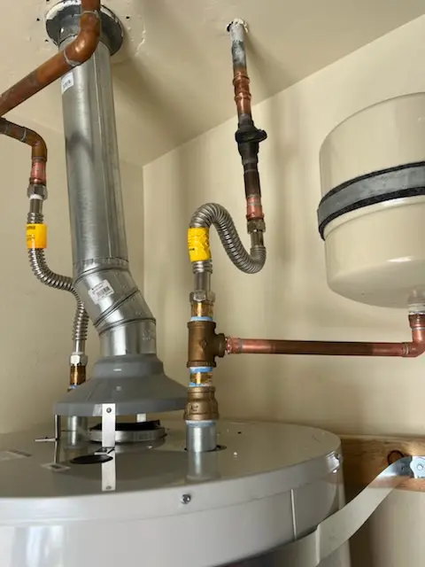 Water heater installation and plumbing repair in Fisherville